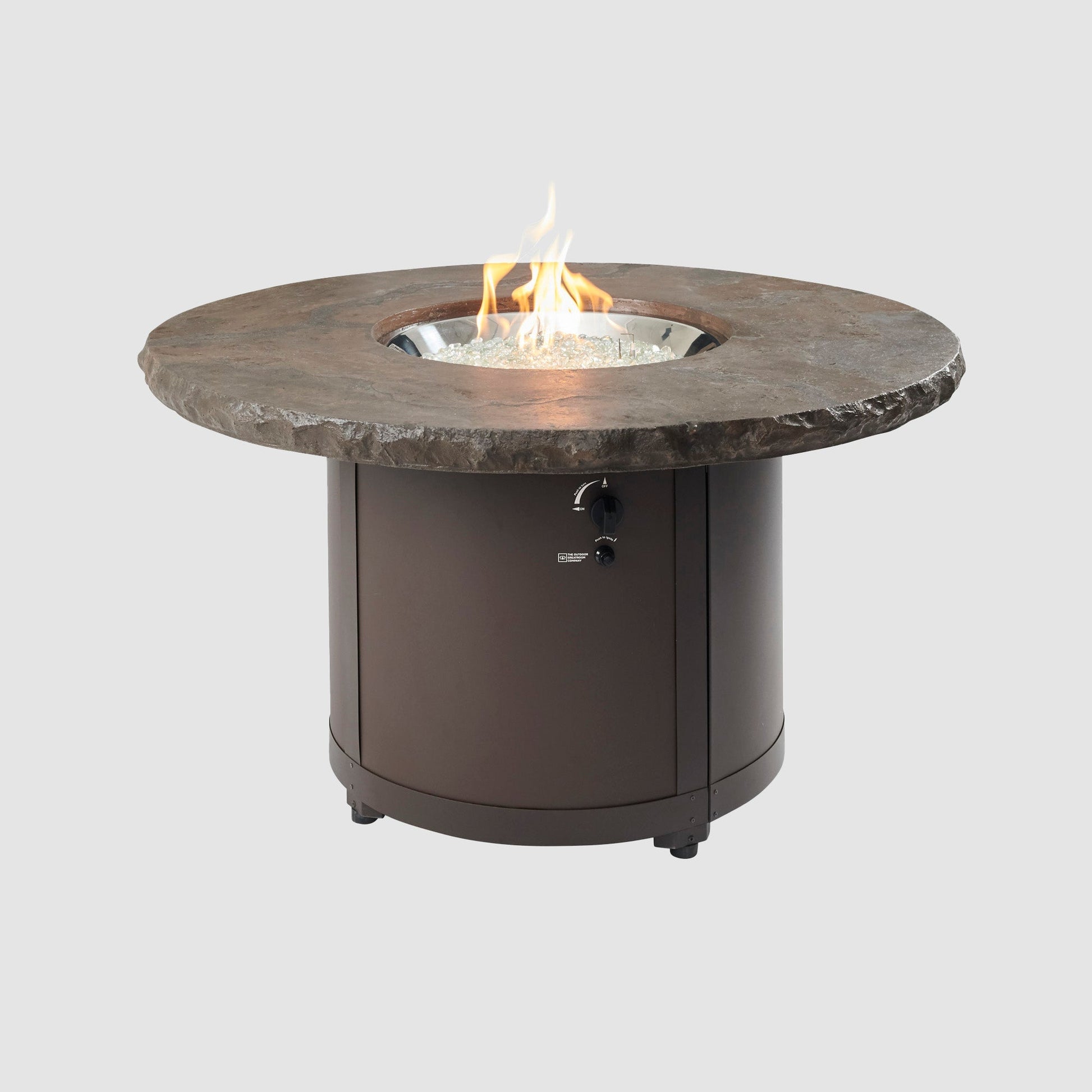The Marbleized Noche Beacon Round Gas Fire Pit Table on a grey background