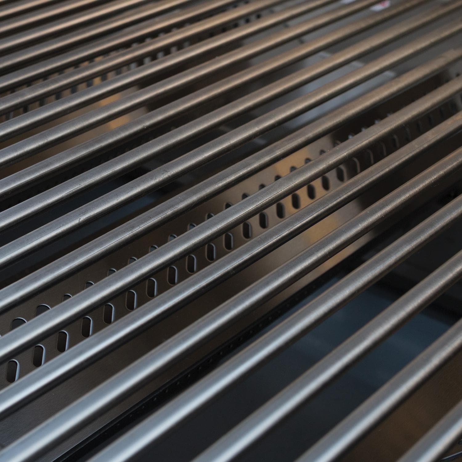 Close-up of a metal grill grate