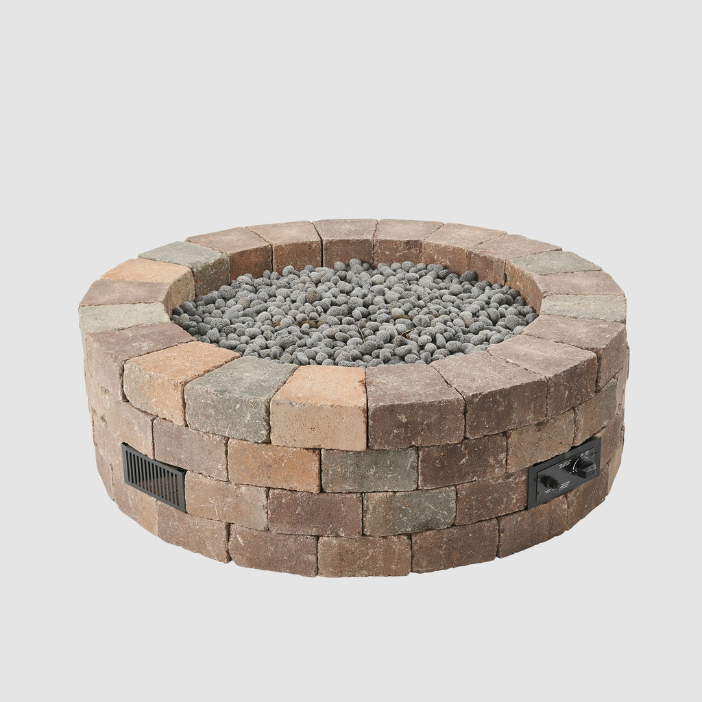 Bronson Block Round Gas Fire Pit Kit with lava rock on the burner
