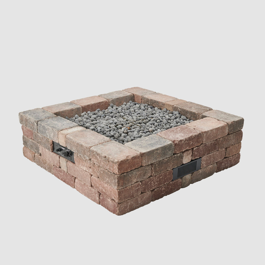 Bronson Block Square Gas Fire Pit Kit with lava rock on the burner