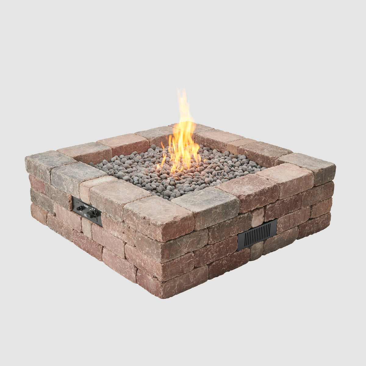Bronson Block Square Gas Fire Pit Kit, lit, on a grey background