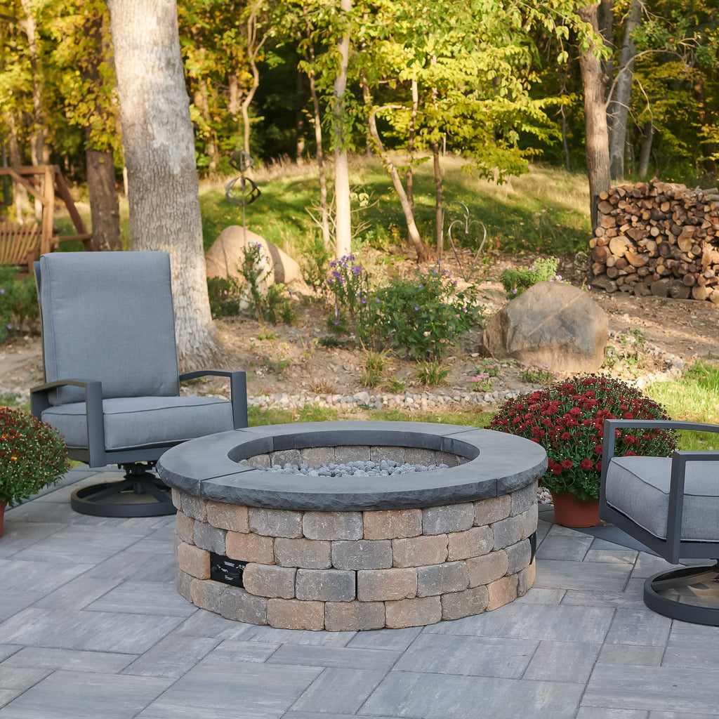 Bronson Block Round Gas Fire Pit Kit with the optional Charcoal Grey concrete top