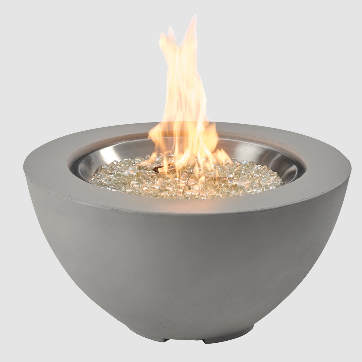 29-inch Cove Concrete round gas fire pit bowl in Natural Grey with lit flame on grey background