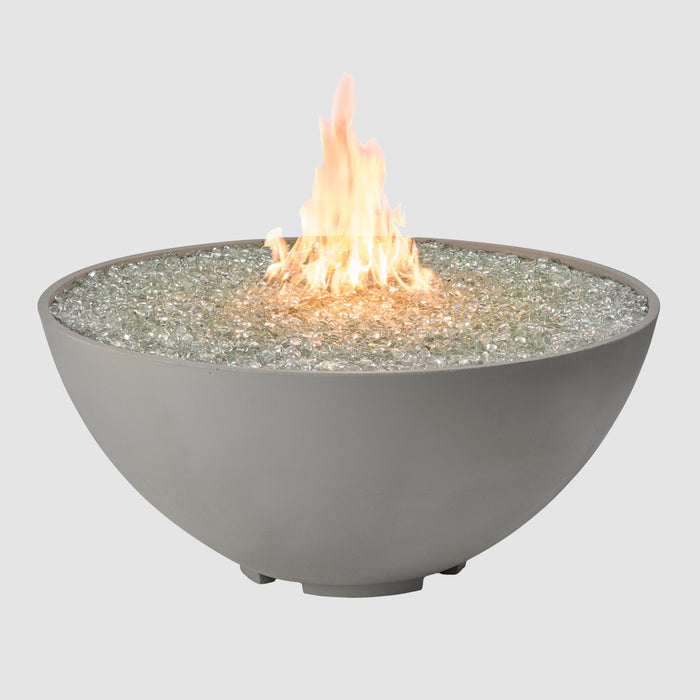 A Cove Edge Round Gas Fire Pit Bowl 42" with Flame on a grey background