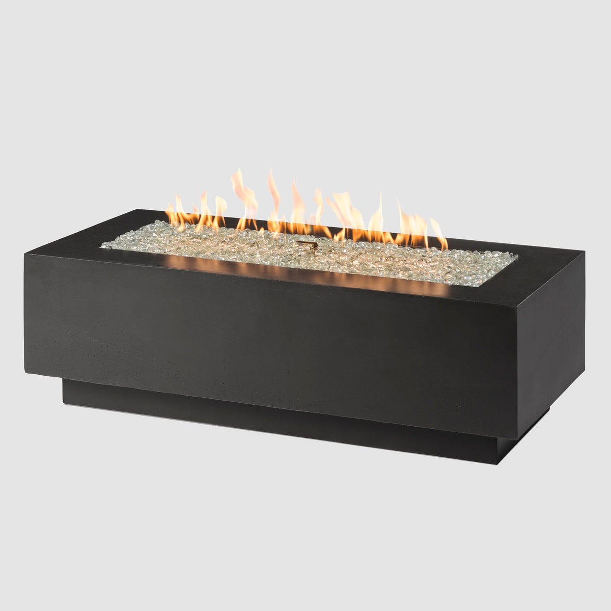 54-inch Cove Concrete linear gas fire pit in Midnight Mist with lit flame on grey background