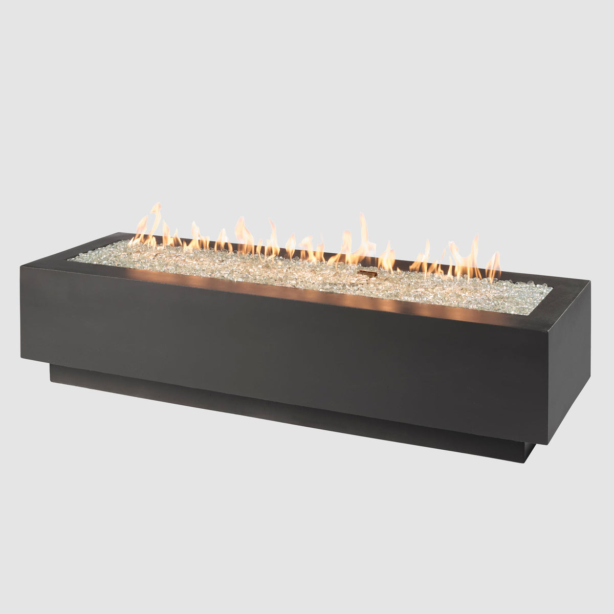 72-inch Cove Concrete linear gas fire pit in Midnight Mist with lit flame on grey background