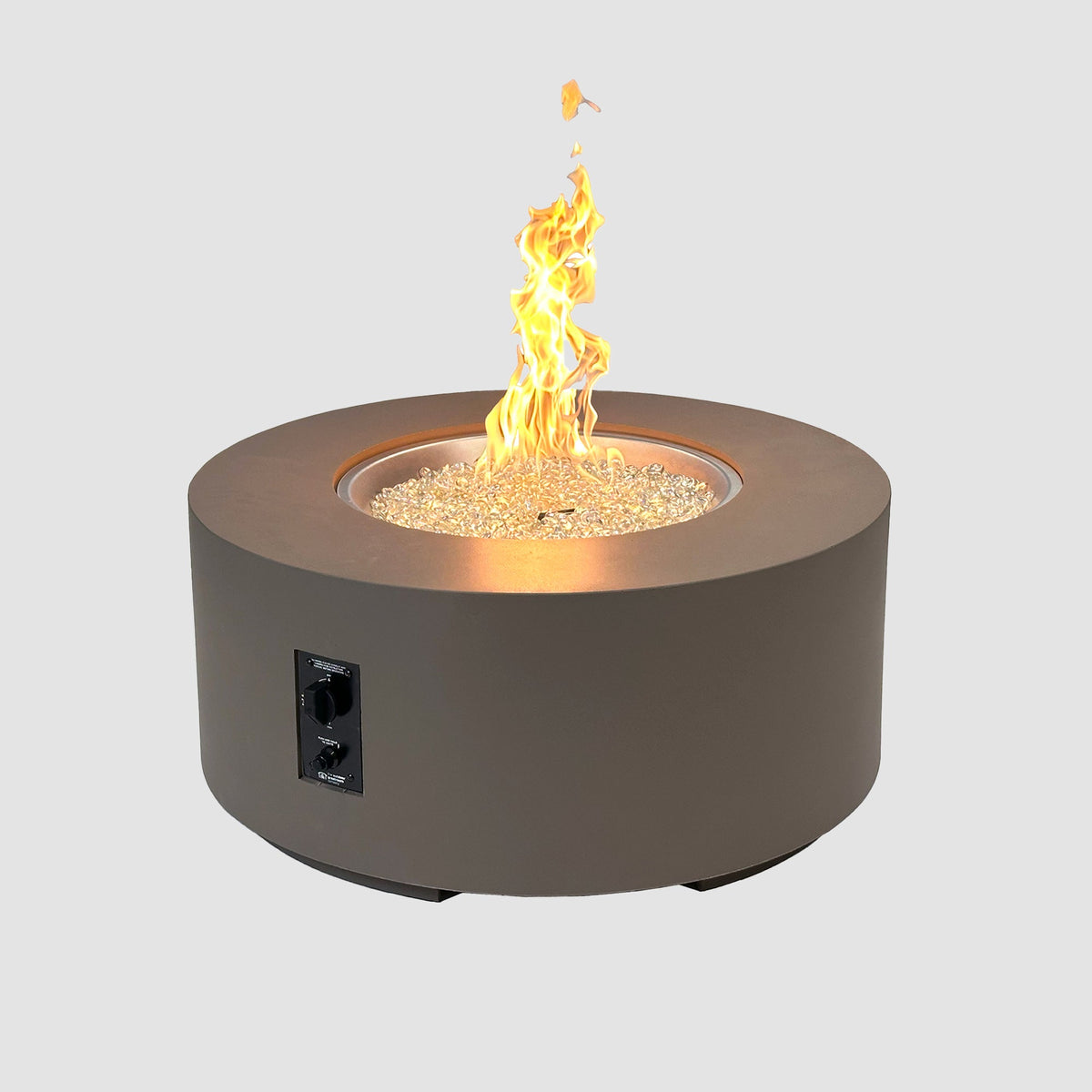 36-inch Cove Concrete round gas fire pit table in Earth Stone with lit flame