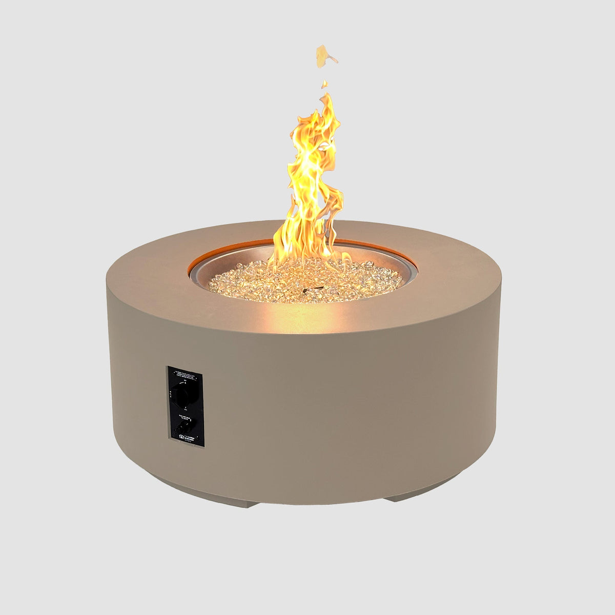 36-inch Cove Concrete round gas fire pit table in Latte with lit flame