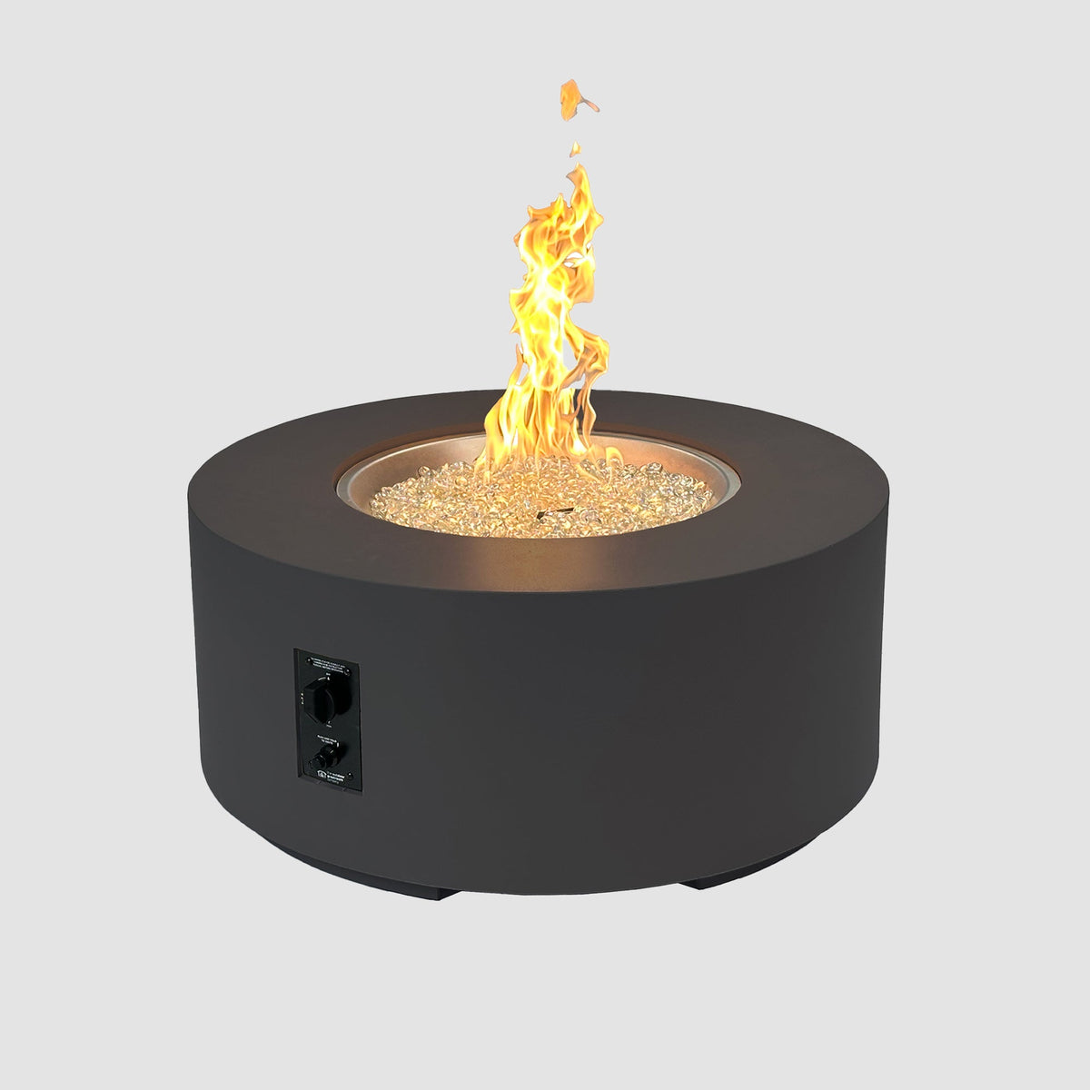 36-inch Cove Concrete round gas fire pit table in Midnight Mist with lit flame