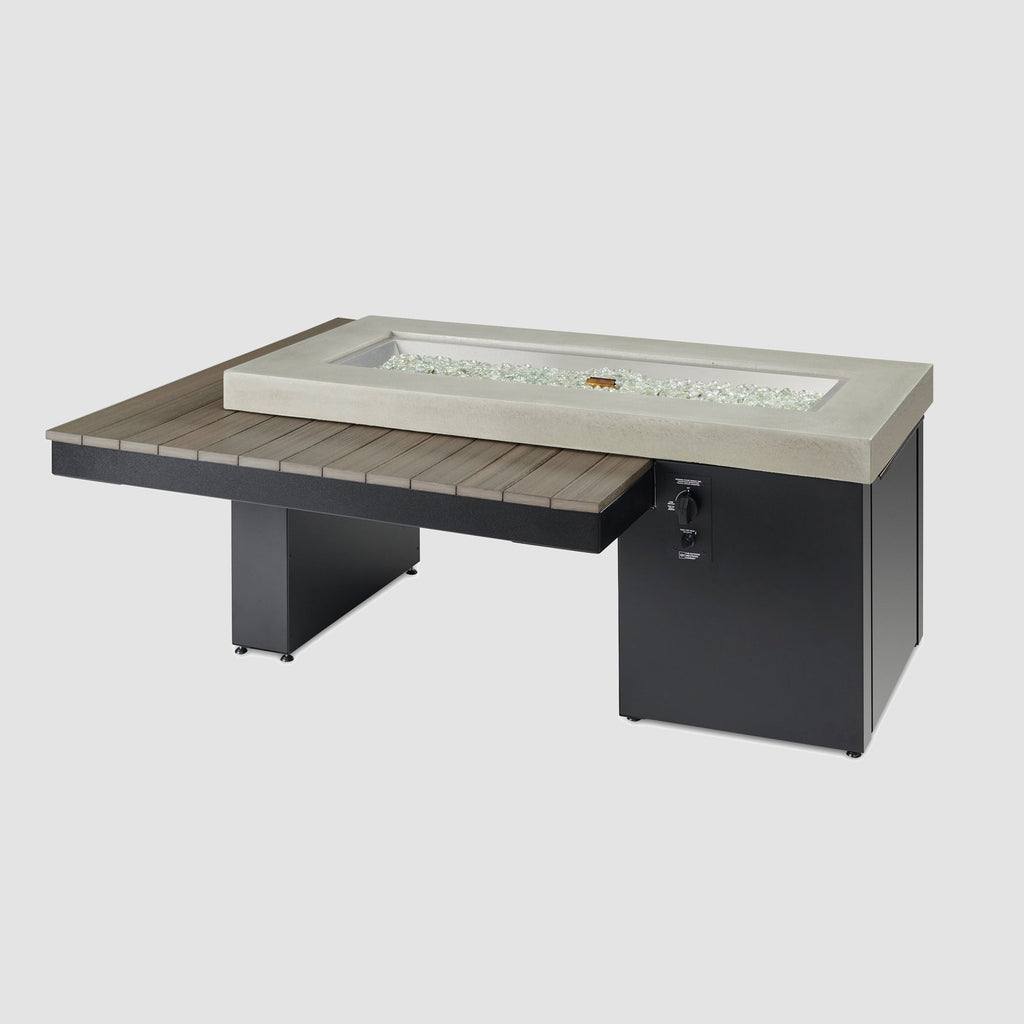 Uptown Coastal Grey linear gas fire pit table on a grey background