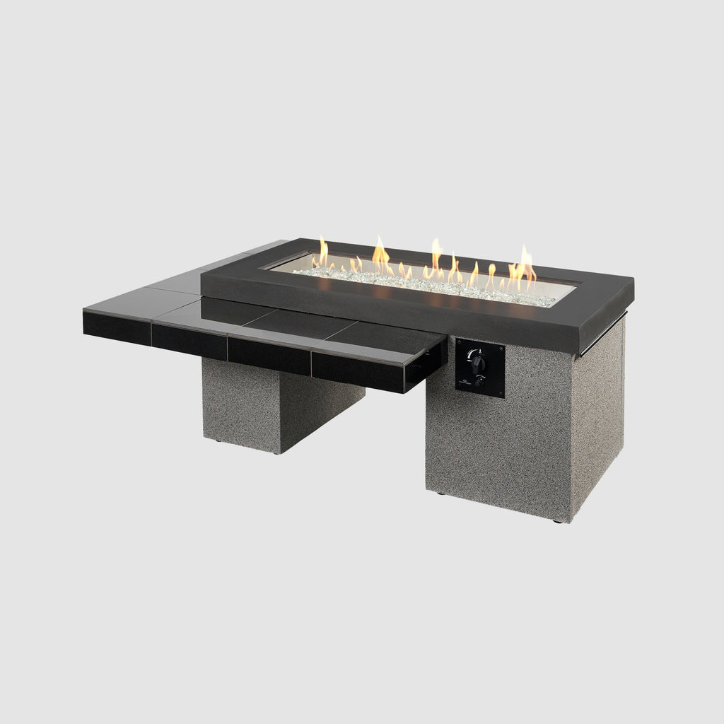 Uptown Black linear gas fire pit table lit on a grey background