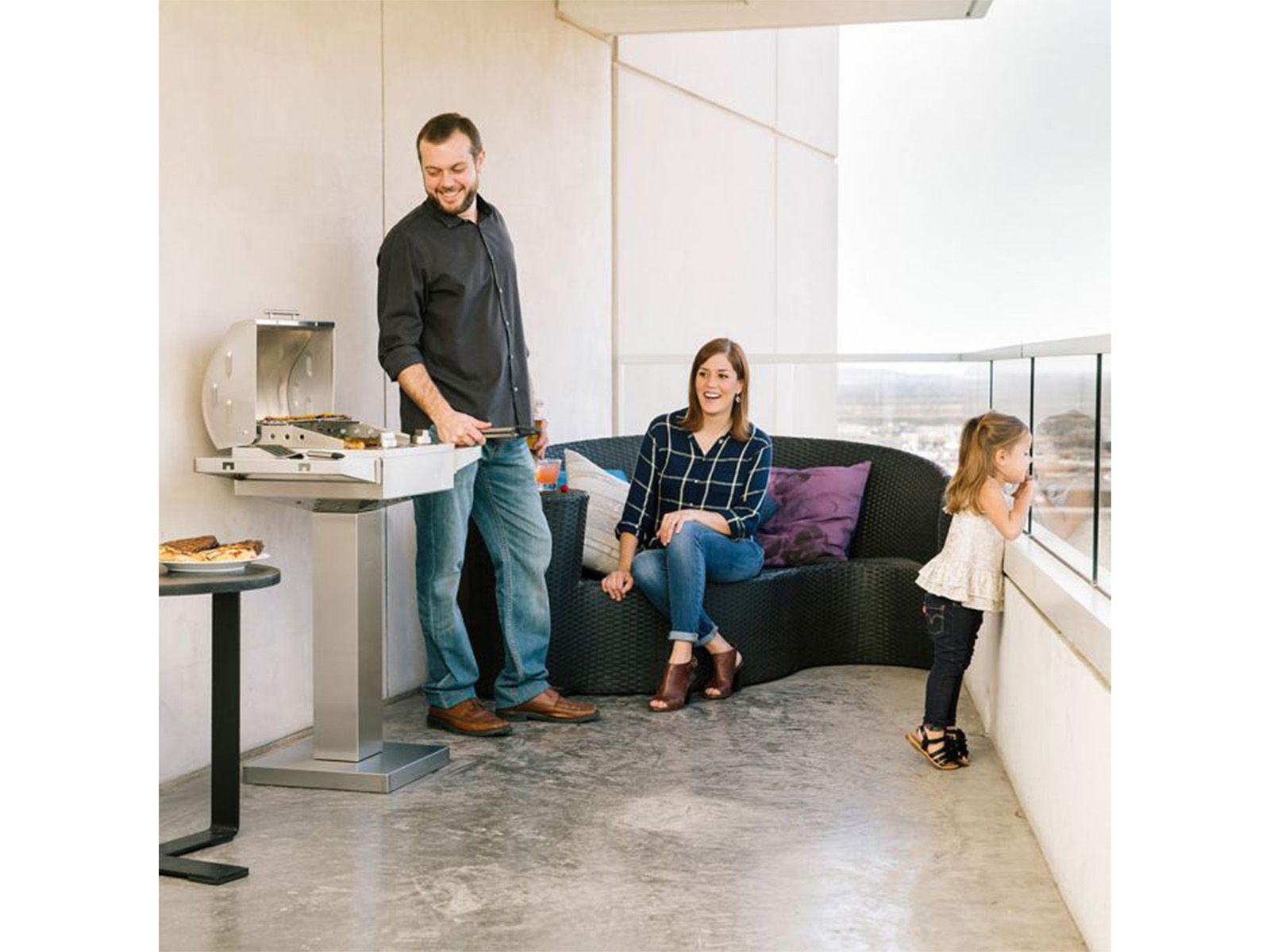 coyote 18-inch built-in / portable 1300 watt electric grill on patio post