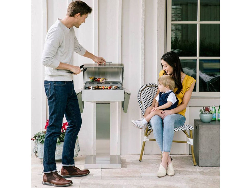 coyote 18-inch built-in / portable 1300 watt electric grill on patio post