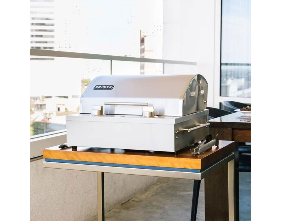 Parrilla eléctrica portátil Coyote de 18 pulgadas y 1300 vatios 