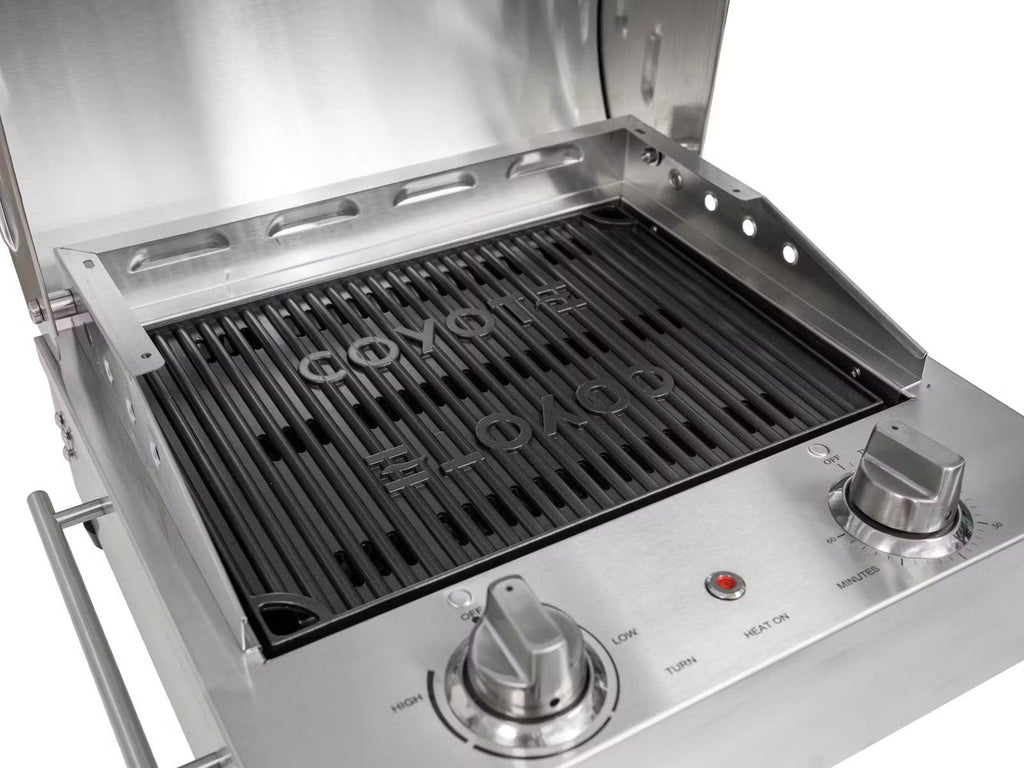 coyote 18-inch built-in / portable 1300 watt electric grill on patio post