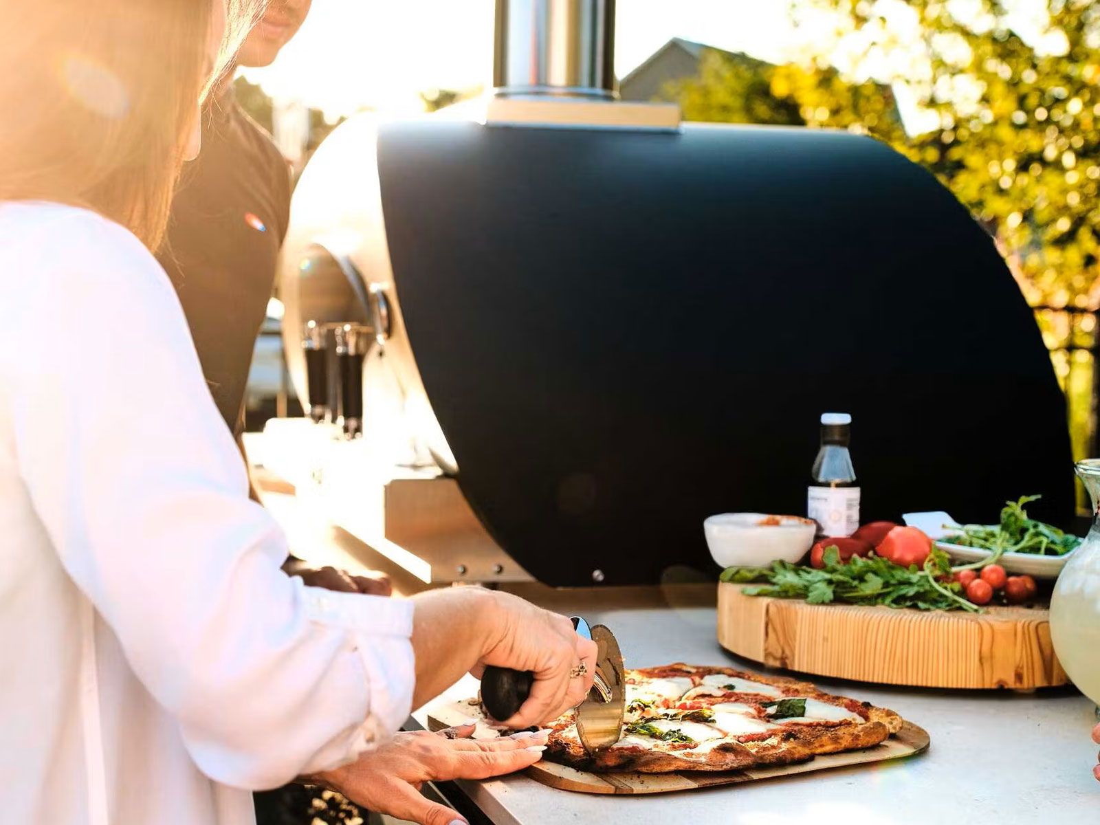 coyote 40-inch duomo wood-fired pizza oven - copper