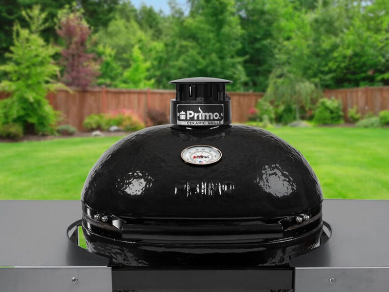 Primo Oval XL 400 Ceramic Kamado Grill On Curved Cypress Table